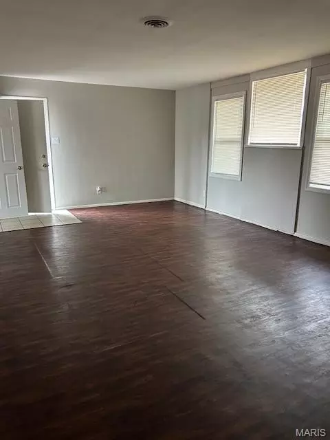 Living - 6826 Friarwood Dr, Berkeley, MO 63134 photo 3 of 3