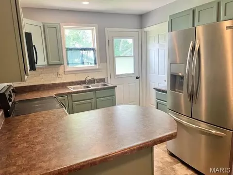Kitchen - 218 E Jefferson St, Palmyra, MO 63461 photo 1 of 3