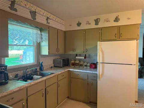 Kitchen - 337 E 1st St, Ramsey, IL 62080 photo 2 of 4
