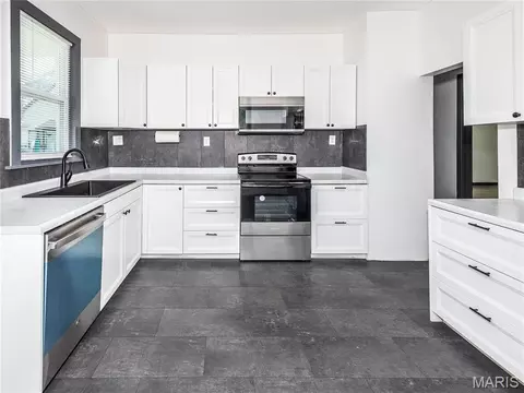 Kitchen - 710 E Main St, Alhambra, IL 62001 photo 1 of 3