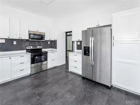 Kitchen - 710 E Main St, Alhambra, IL 62001 photo 2 of 3