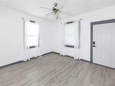 Living - 710 E Main St, Alhambra, IL 62001 photo 2 of 3