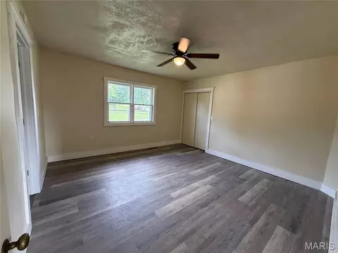 Bedroom - 519 E Walnut St, Perry, MO 63462 photo 2 of 3