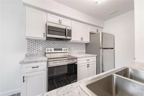 Kitchen - 13 Dixons Ct #B, O'fallon, MO 63366 photo 2 of 3