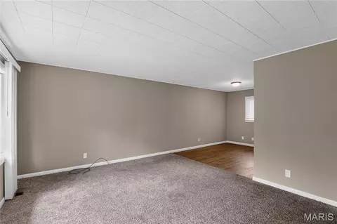 Living - 1027 Renshaw Dr, Ferguson, MO 63135 photo 4 of 5