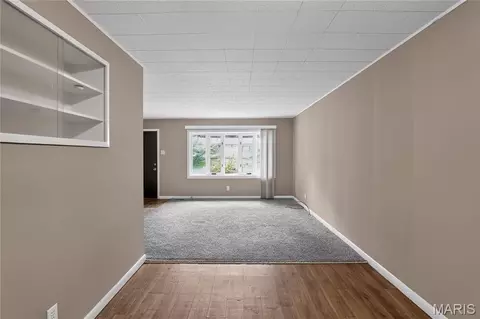 Living - 1027 Renshaw Dr, Ferguson, MO 63135 photo 3 of 5