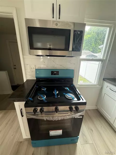 Kitchen - 229 W Thomas St, Roxana, IL 62084 photo 2 of 3