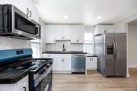 Kitchen - 229 W Thomas St, Roxana, IL 62084 photo 2 of 3