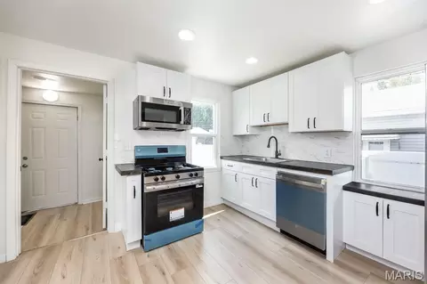 Kitchen - 229 W Thomas St, Roxana, IL 62084 photo 1 of 3