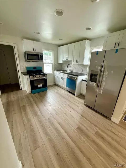 Kitchen - 229 W Thomas St, Roxana, IL 62084 photo 1 of 3