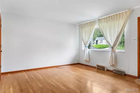 Living - 6138 Emerald Ave, Ferguson, MO 63135 photo 1 of 3