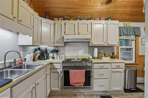 Kitchen - 515 E 3rd North St, Mount Olive, IL 62069 photo 3 of 3
