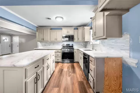 Kitchen - 416 S Cooter Rd, Steele, MO 63877 photo 3 of 3