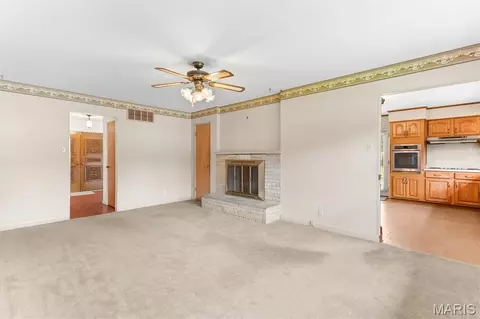 Living - 10215 Dovercrest Dr, Sappington, MO 63128 photo 2 of 6