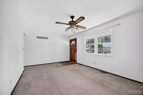 Living - 4116 Bridge Hampton Dr, Saint Charles, MO 63304 photo 2 of 8