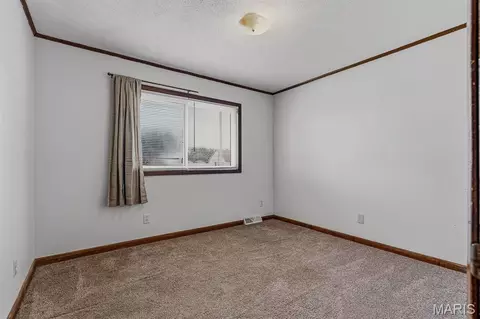 Bedroom - 205 S Lunbeck Ave, Gideon, MO 63848 photo 4 of 4