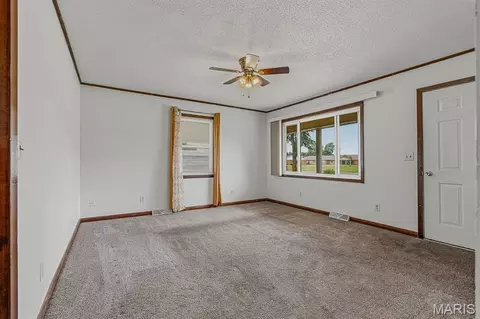 Living - 205 S Lunbeck Ave, Gideon, MO 63848 photo 1 of 2