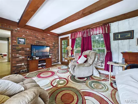 Living - 22 Frontenac Pl, Godfrey, IL 62035 photo 3 of 6