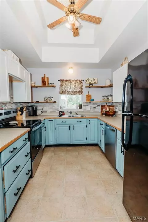 Kitchen - 150 Cedar Circle Dr, Vienna, MO 65582 photo 5 of 9