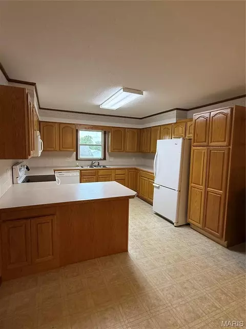 Kitchen - 12376 Biram Dr, Plato, MO 65552 photo 3 of 3
