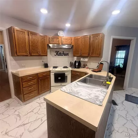 Kitchen - 612 S Walnut St, Kennett, MO 63857 photo 2 of 5