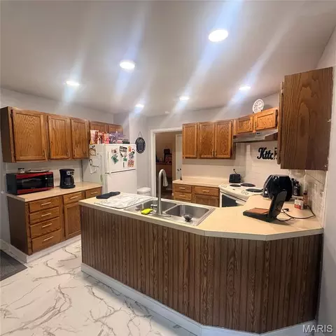 Kitchen - 612 S Walnut St, Kennett, MO 63857 photo 1 of 5