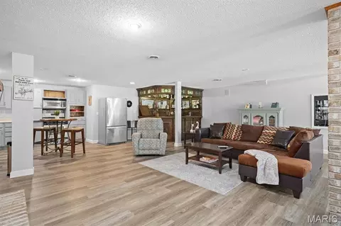 Living - 609 E Waters Edge Dr, Shiloh, IL 62221 photo 2 of 3