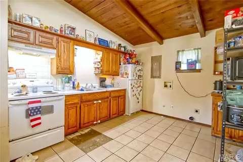 Kitchen - 220 N Olive St, Marshfield, MO 65706 photo 1 of 2