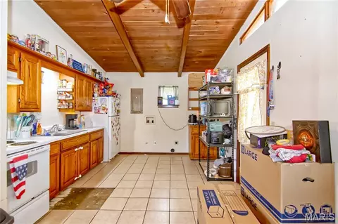 Kitchen - 220 N Olive St, Marshfield, MO 65706 photo 2 of 2