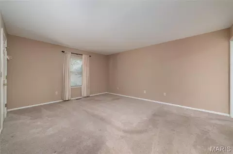 Living - 2296 Delaware Dr, Saint Charles, MO 63303 photo 4 of 4