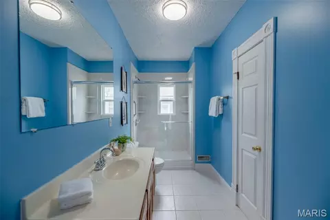 Bath - 7438 Maple Ave, Maplewood, MO 63143 photo 2 of 3