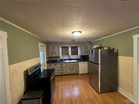 Kitchen - 702 E 3rd St, Salem, MO 65560 photo 2 of 3