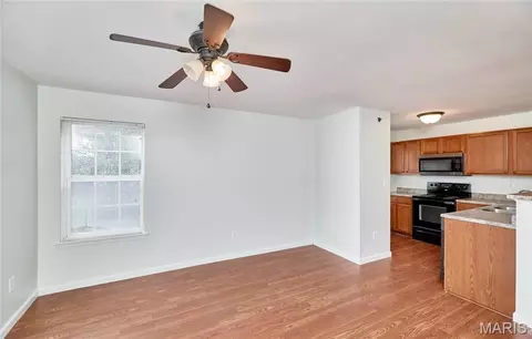 Living - 7101 Spring Creek Ln, O'fallon, MO 63368 photo 5 of 6