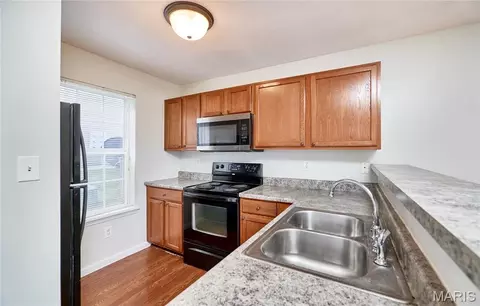 Kitchen - 7101 Spring Creek Ln, O'fallon, MO 63368 photo 2 of 7