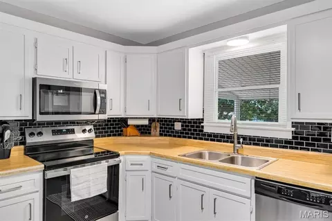 Kitchen - 303 Saint Joseph Ave, O'fallon, MO 63366 photo 3 of 6