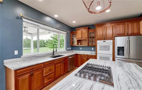 Kitchen - 409 Westridge Dr, Troy, MO 63379 photo 10 of 12
