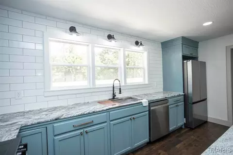 Kitchen - 804 E Main St, Richland, MO 65556 photo 5 of 7