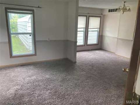 Living - 445 E Sedgwick St, Brookfield, MO 64628 photo 1 of 6