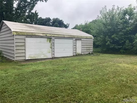 Exterior - 445 E Sedgwick St, Brookfield, MO 64628 photo 4 of 6