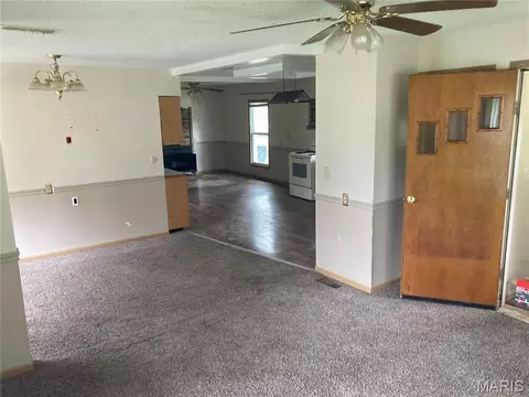Living - 445 E Sedgwick St, Brookfield, MO 64628 photo 3 of 6