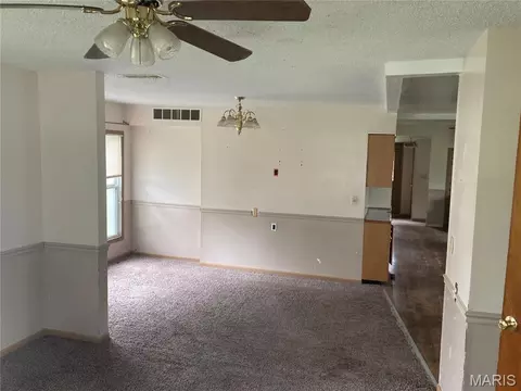 Living - 445 E Sedgwick St, Brookfield, MO 64628 photo 2 of 6