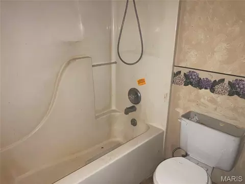Bath - 445 E Sedgwick St, Brookfield, MO 64628 photo 5 of 6