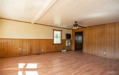 Living - 405 N Walker Ave, Gideon, MO 63848 photo 1 of 2