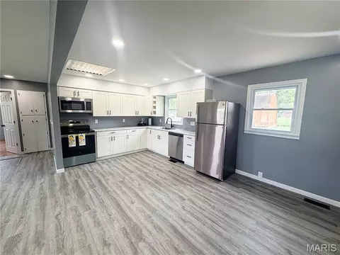 Kitchen - 601 Cooper Ave, Paris, MO 65275 photo 1 of 2
