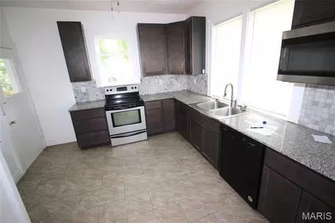 Kitchen - 213 E Walnut St, Arcadia, MO 63621 photo 1 of 2