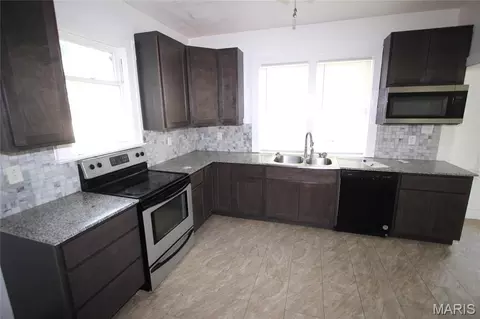 Kitchen - 213 E Walnut St, Arcadia, MO 63621 photo 2 of 2