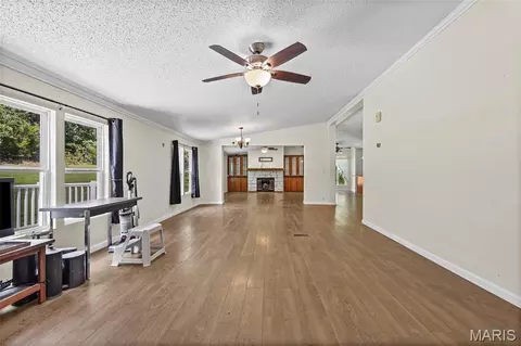 Living - 7448 Turn Bo Ranch Rd, Dittmer, MO 63023 photo 1 of 7