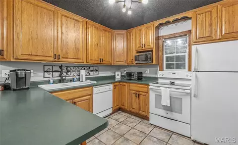 Kitchen - 116 E Clinton St, Grafton, IL 62037 photo 1 of 2