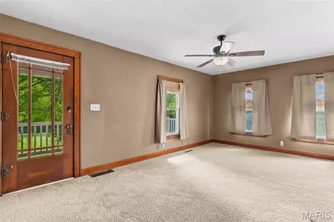 Living - 25159 E County Line Rd, Waggoner, IL 62572 photo 4 of 4