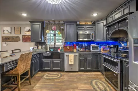 Kitchen - 302 Cooper St, Dexter, MO 63841 photo 2 of 2